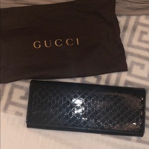 Super cute patent leather gucci clutch